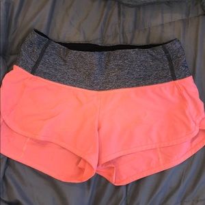 salmon colored lululemon hotty hot shorts